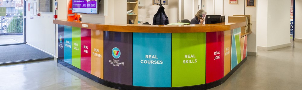 Interior shot of Heart of Worcestershire College's All Saints' reception desk