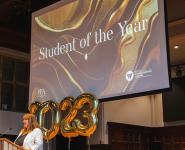 Student of the year award slide with balloons at the 2023 FE Award ceremony