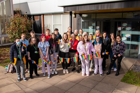 A group of students supporting their pride event