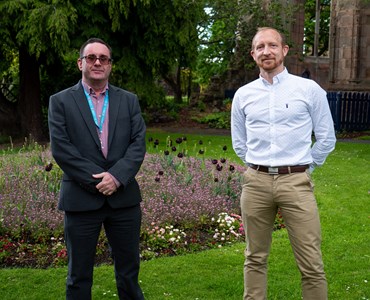 James Duckhouse, Digital Curriculum Manager for How College, with Craig Matthews, CEO of Osprey Approach in Malvern stood side by side outside