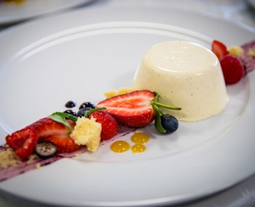 A visually appealing dessert created by a catering student