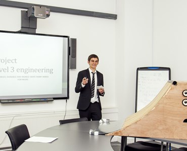 Student presenting his engineering project