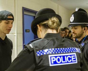 Police talking to a male