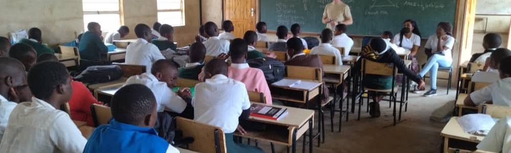 Man teaching children in Malwai